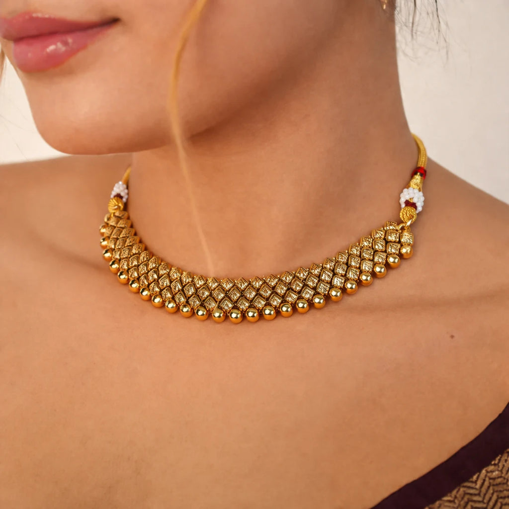 Pushpanjali antique gold necklace