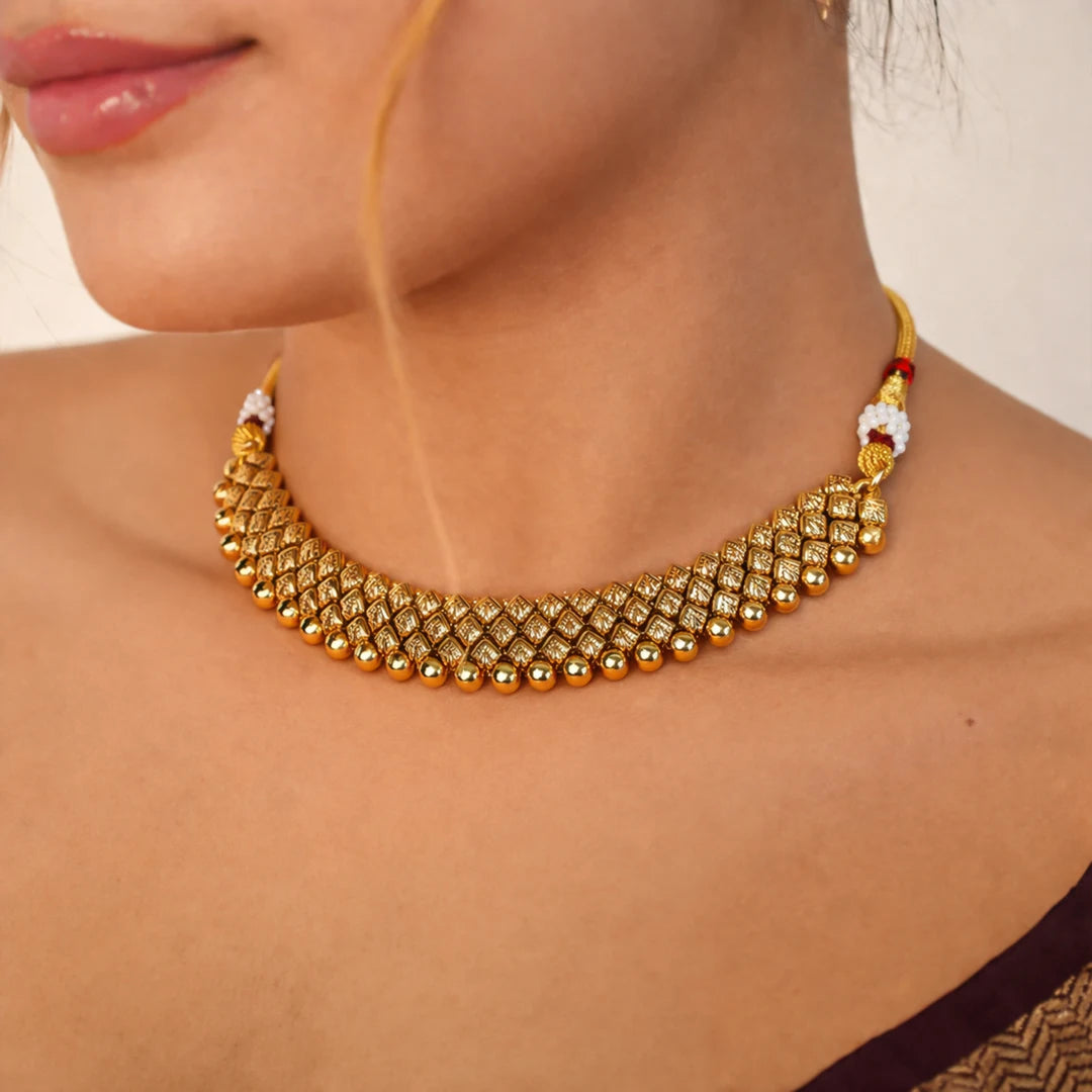 Pushpanjali antique gold necklace