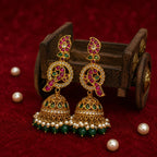 Noorika Kundan Pearl Jhumka Earrings with Green Bead Drops for Women
